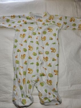 Plush White Baby Footed One-Piece with Green & Orange Toy Print